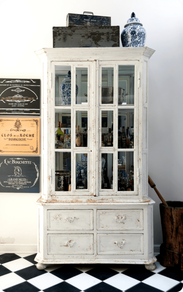 white cabinet with checkered floor